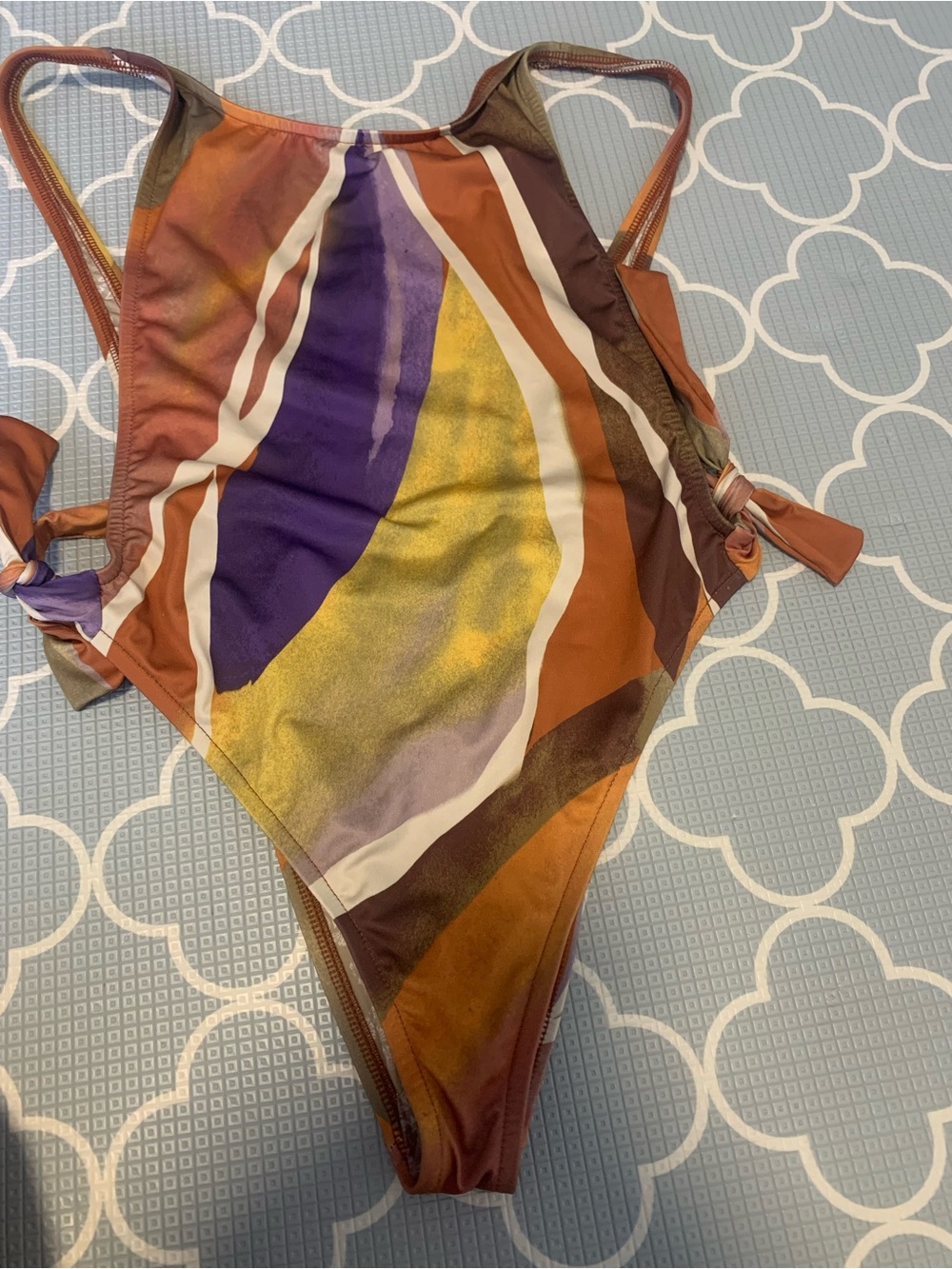 Abstract Multicolor One-Piece Swimsuit — Purple & Gold Accents